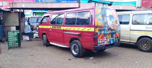 Nissan Caravan (Urvan) 2009 Red - thumbnail 3