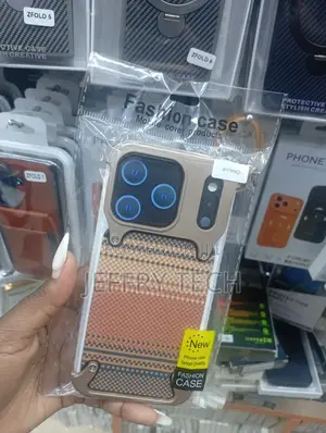 Tan and Brown Patterned iPhone 17 Pro Case With a Metallic Frame