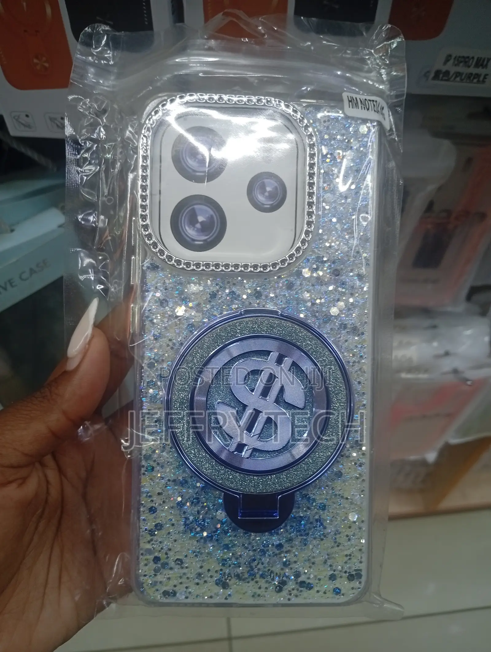 iPhone Cases Glitter, Rhinestones, and a Rotating Dollar Sign Spinner.