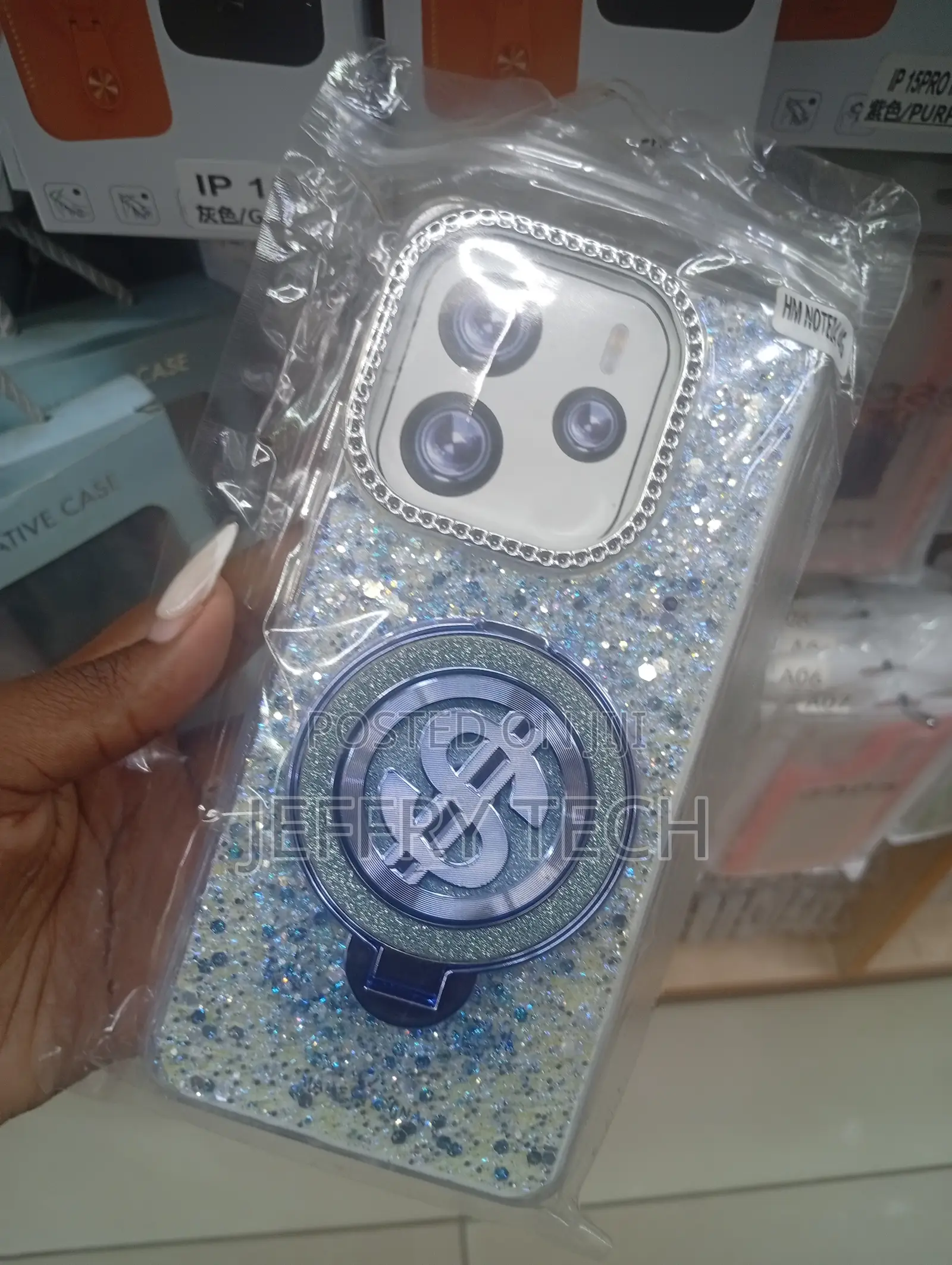 iPhone Cases Glitter, Rhinestones, and a Rotating Dollar Sign Spinner.