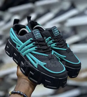 Unisex Versace Chunky Sneakers Featuring a Thick, Sculpted Outsole