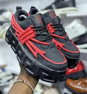 Unisex Versace Chunky Sneakers Featuring a Thick, Sculpted Outsole