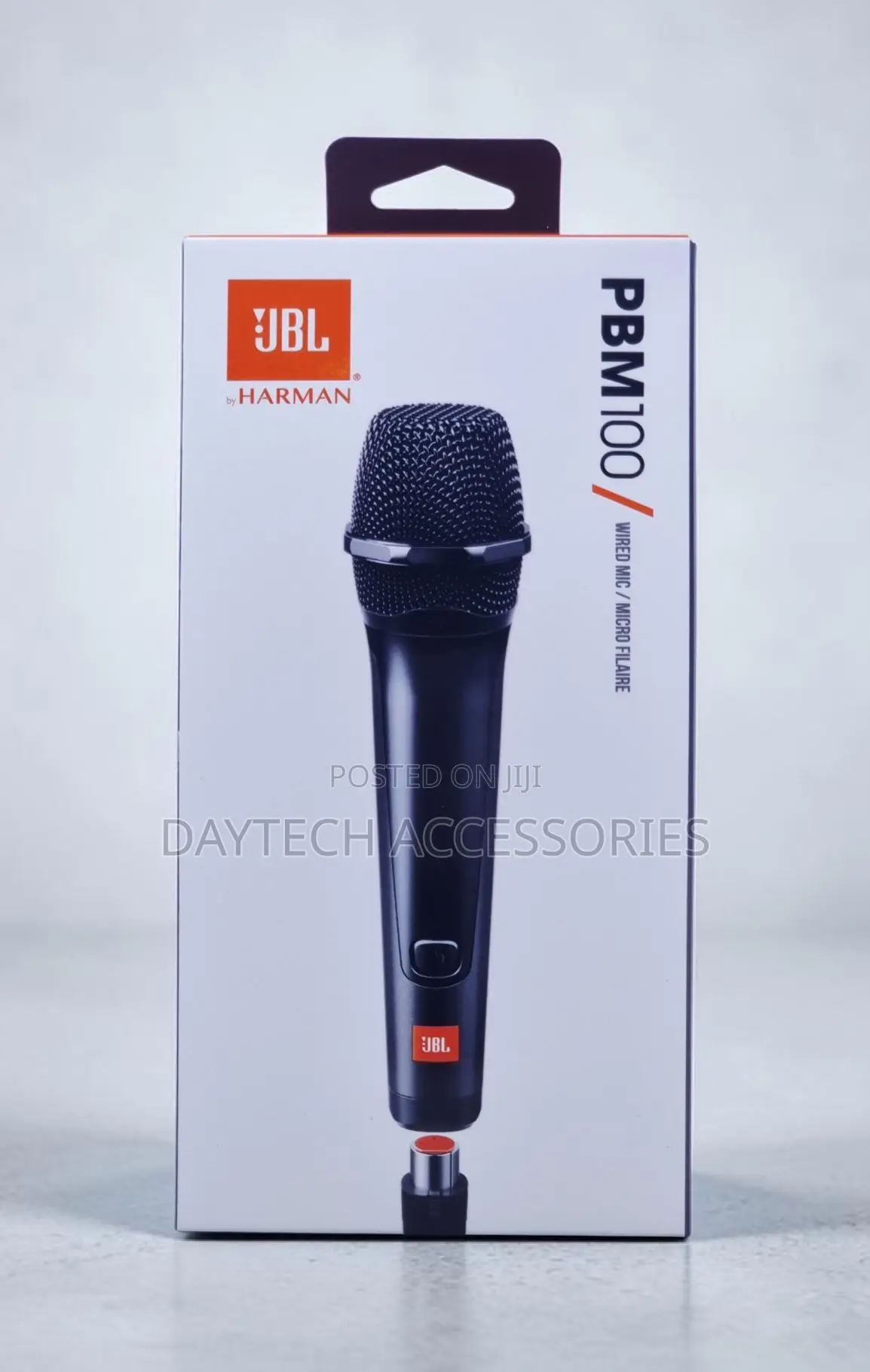 This Is a JBL Pbm100 Wired Dynamic Vocal Microphone in a Black Color.