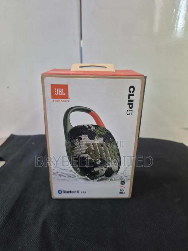 Green JBL Clip 5 Portable Speakers