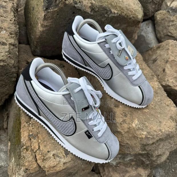 Nike Cortez All Petals United Sneakers in a Silver Colorway.