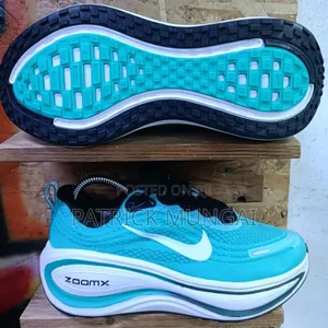 Nike Vomero Plus Running Shoes