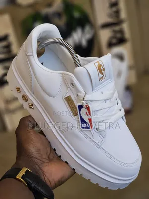 Louis Vuitton 'Nba Lakers' Sneakers in White With Gold Accents.
