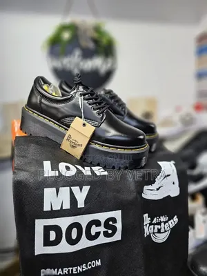 Dr Martens Low Sneakers in Black and Yellow Lining Double Sole.