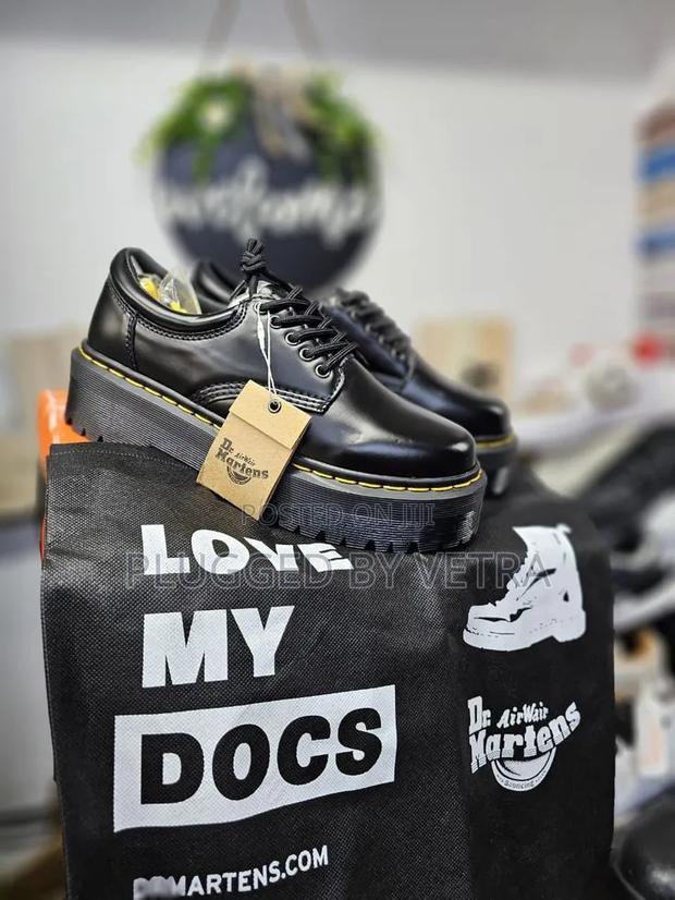 Dr Martens Low Sneakers in Black and Yellow Lining Double Sole.