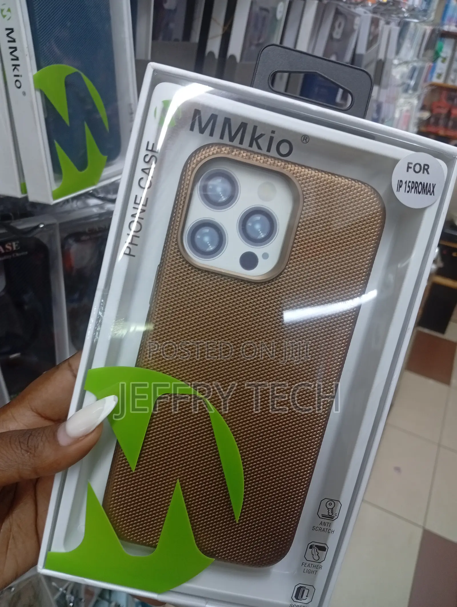 Mmkio Carbon Fiber Texture Phone Case for the iPhone 15 Pro Max.