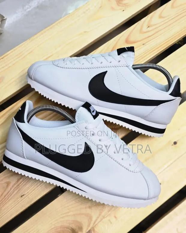 Nike Cortez Sneakers in a White and Black Tic Colorway.