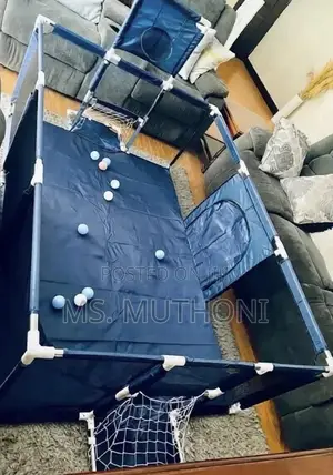 Baby Playpen With A Basketball Hoop And A Soccer Goal Net