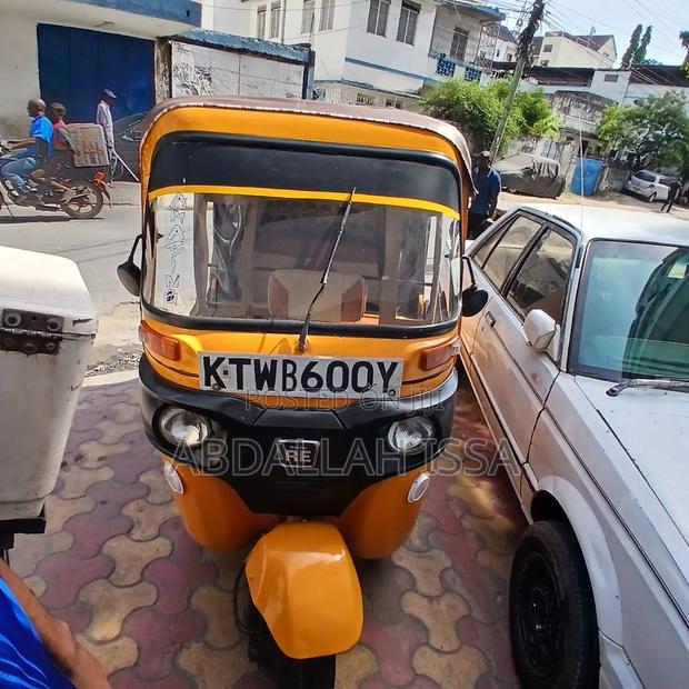 Bajaj RE 2022 Yellow - thumbnail 2