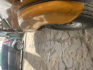 Bajaj RE 2022 Yellow