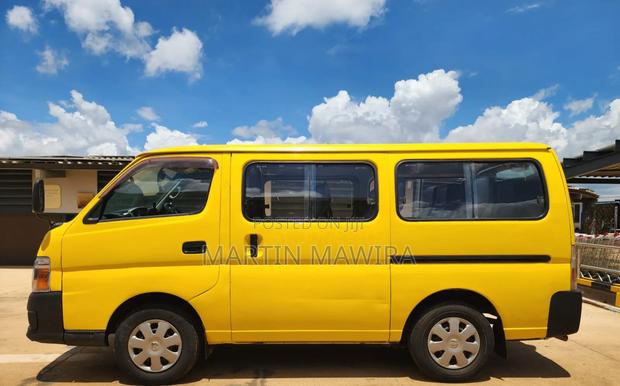 Nissan Caravan (Urvan) 2013 Yellow - thumbnail 4
