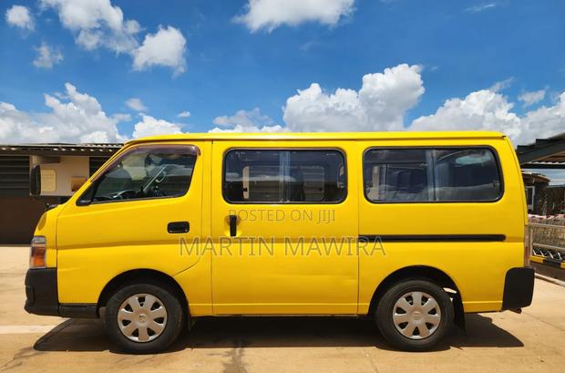 Nissan Caravan (Urvan) 2013 Yellow - thumbnail 5