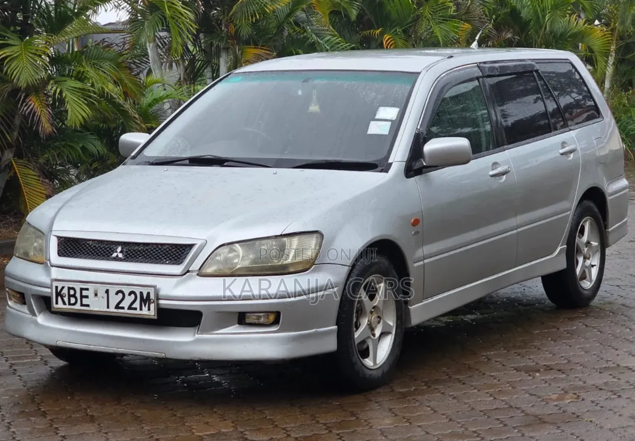 Mitsubishi Lancer Cedia OZ Rally 2004 Silver