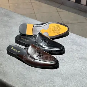 John Foster Leather Mule Loafers Featuring a Chain Detail