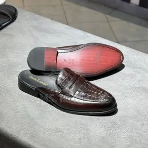John Foster Leather Mule Loafers Featuring a Chain Detail