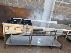 Customized Stainless Steel 4-Burner Cooker With a Working Space