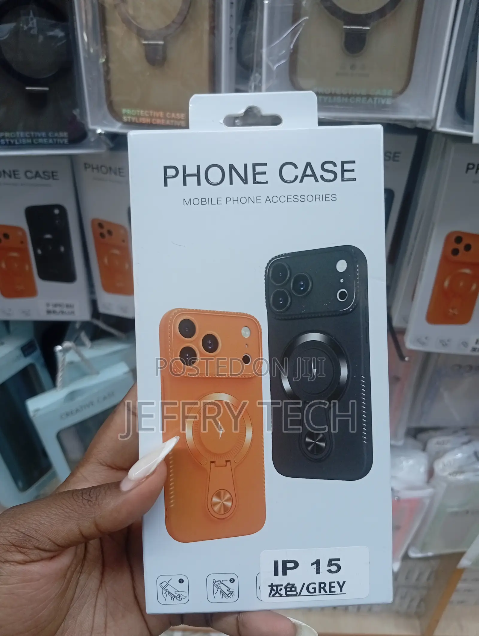 Magnetic Charging Phone Covers for the iPhone 15 in Grey and Orange.
