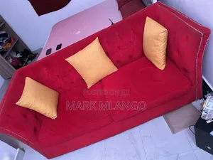 Red 3 Seater
Ks.
Red Three Seater and Three Yellow Throwing Pillows