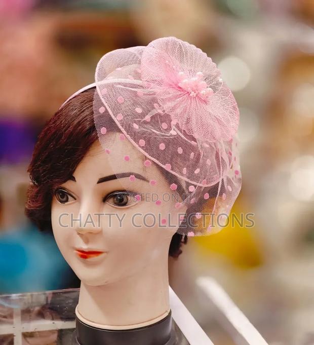 Light Pink Stylish and Classy Ladies Head Fascinators With Net - main view