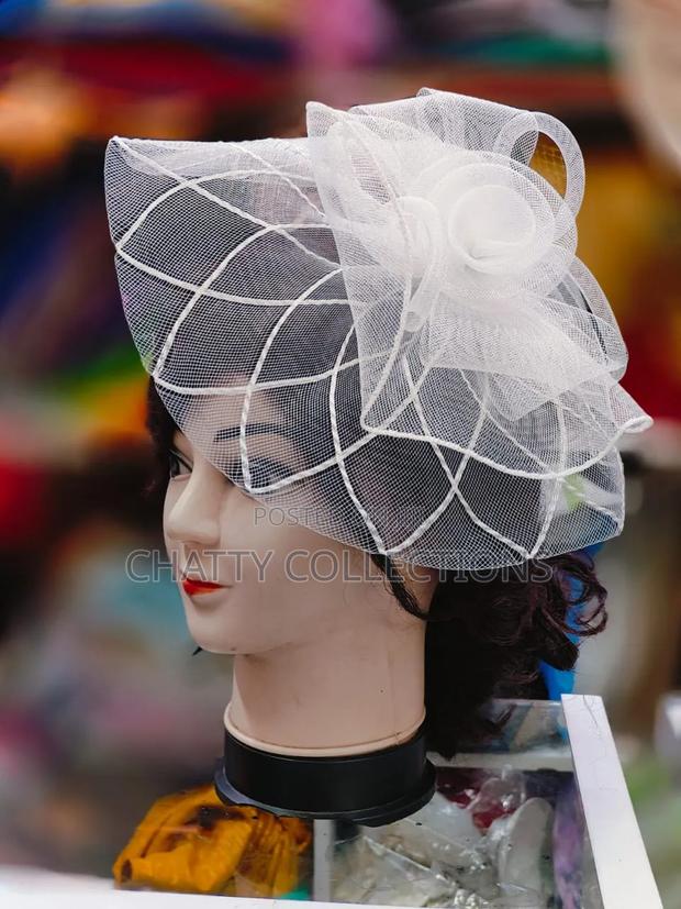 White Stylish and Classy Ladies Head Fascinators With Net