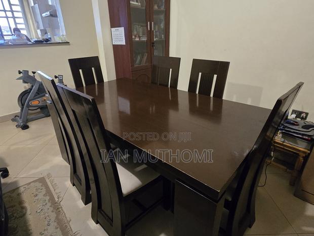 Hardwood Six Seater Dining Table With Cushioned Seats Pristine