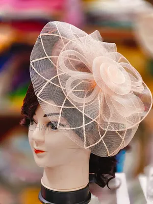 Peach Classy and Stylish Ladies Head Fascinators