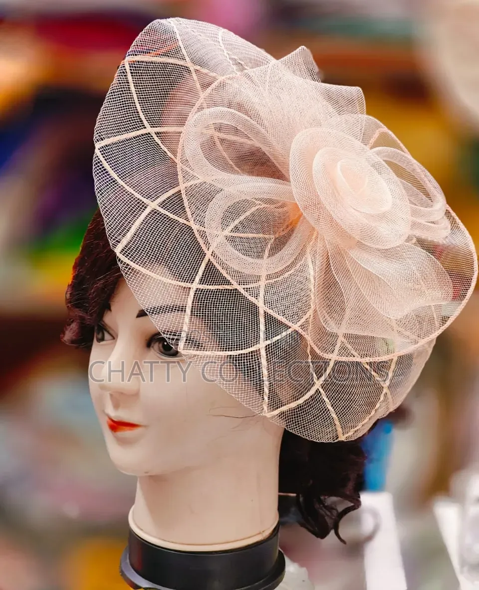 Peach Classy and Stylish Ladies Head Fascinators