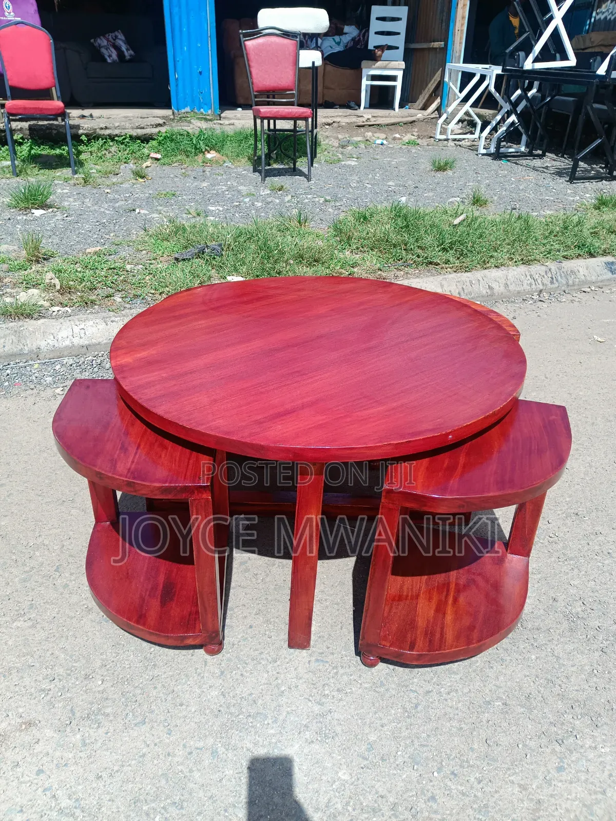 A Set of 1 Big Coffee Table and 4 Small Ones.