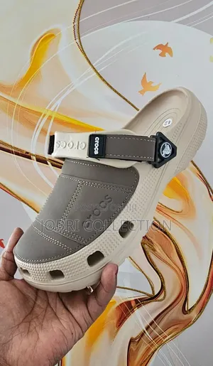 Beige Crocs Yukon Sandals