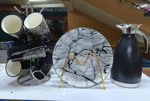 13 Pieces High Quality Dinner Sets;
6 Plates
6 Cups
1 Flask 
 at 4000