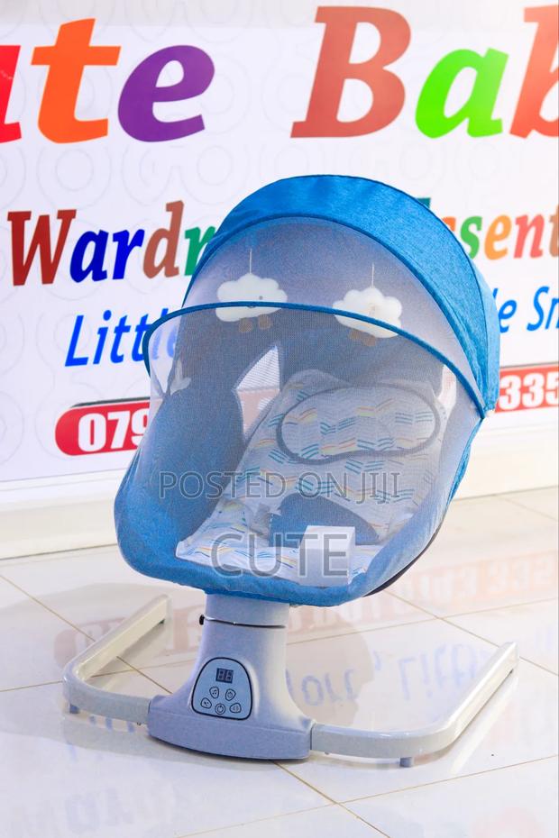 Deluxe Electric Baby Swing – Multiple Speeds Soothing Music