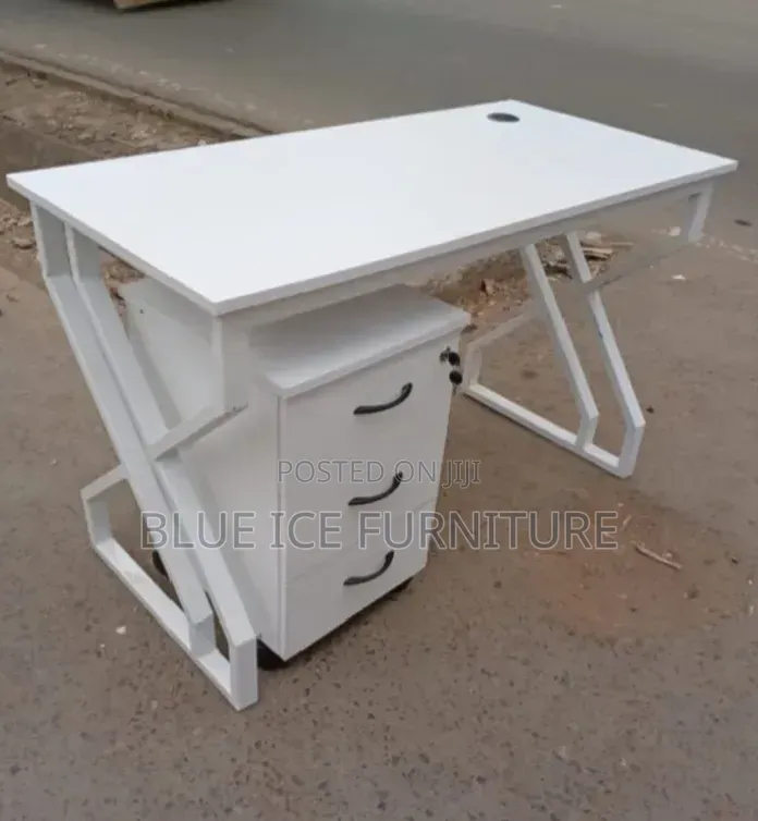 Office With Metallic Desk With White Lockable Drawers