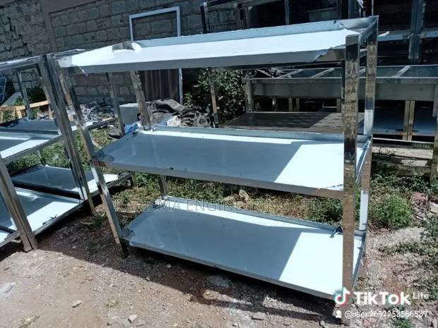 Stainless Steel Storage Racks Often Used in Commercial Kitchens.