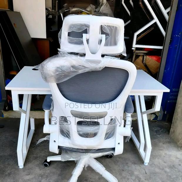 Metallic Table and White Executive Chair