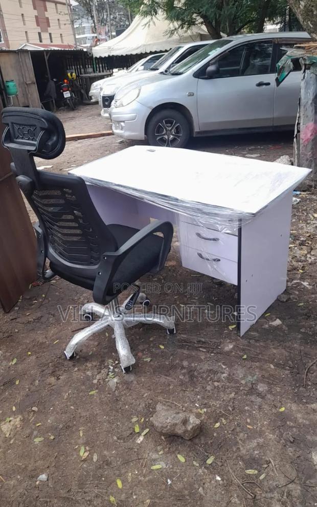 White Wooden Office Desk With 3 Drawers and Black Office Chair