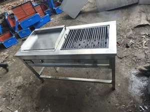 Commercial Gas Griddle and a Charcoal Grill