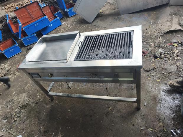 Commercial Gas Griddle and a Charcoal Grill