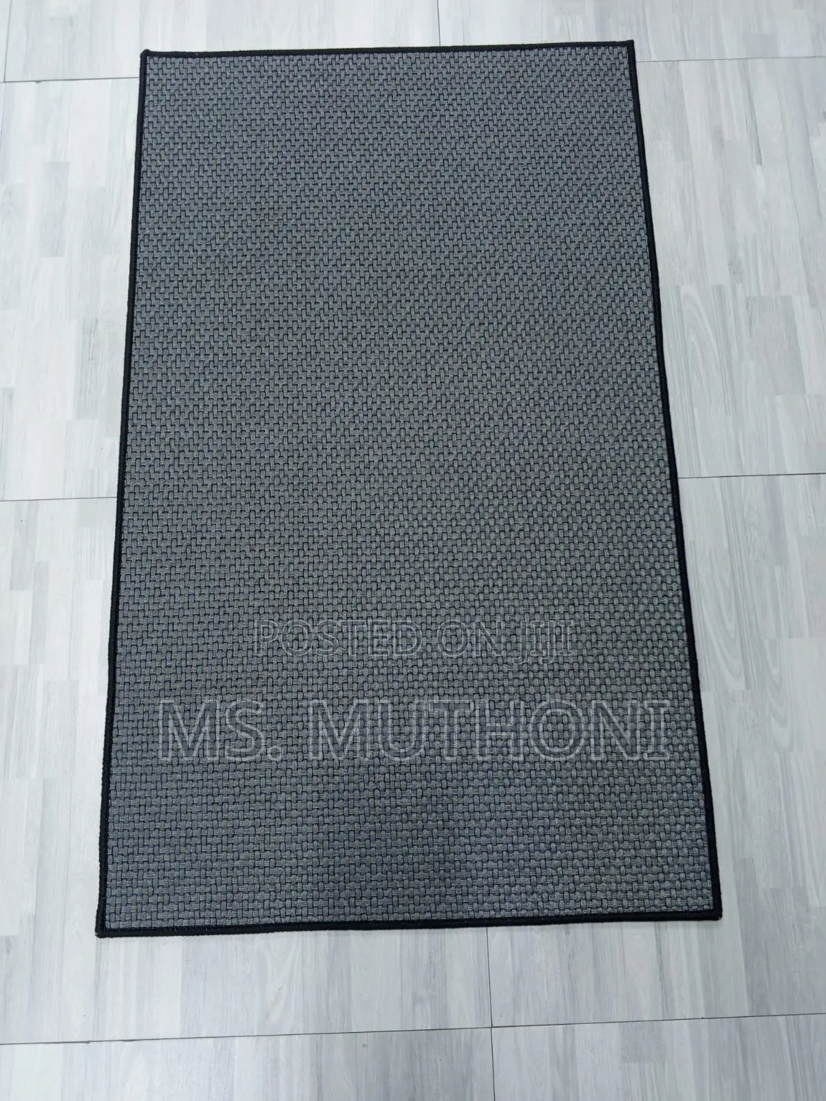 Solid Color Dirt Trapper Doormats Featuring a Non-Slip Backing.