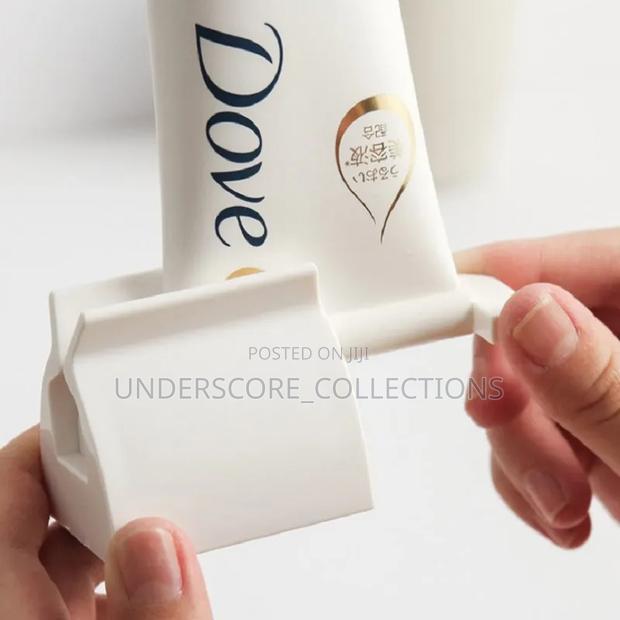 *Roll Up Toothpaste Squeezer*