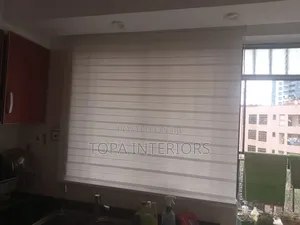 White Roller Blinds for Home and Office Window Treatment