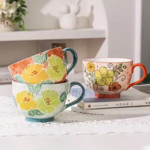 Hand Painted Embossed Flower Mugs at 700 Per Pc