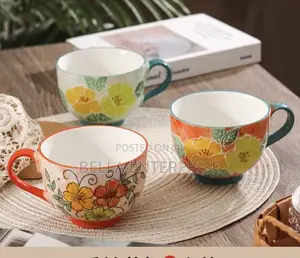 Hand Painted Embossed Flower Mugs at 700 Per Pc
