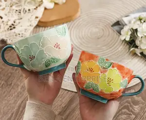 Hand Painted Embossed Flower Mugs at 700 Per Pc