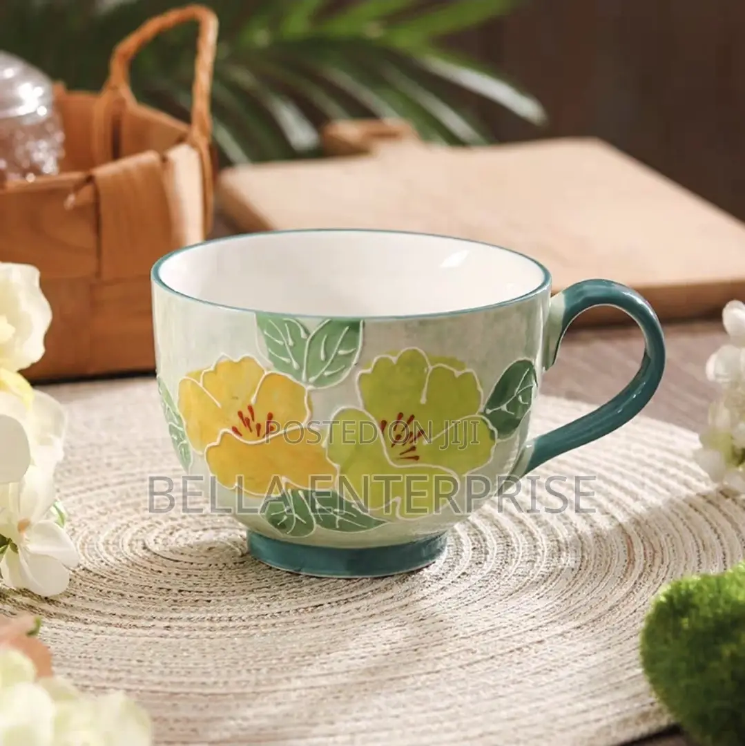 Hand Painted Embossed Flower Mugs at 700 Per Pc