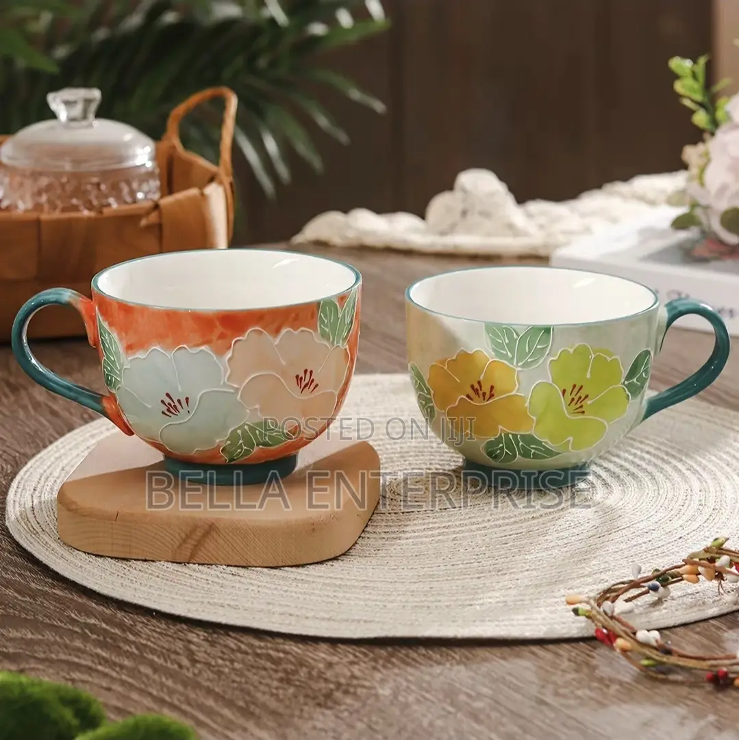 Hand Painted Embossed Flower Mugs at 700 Per Pc