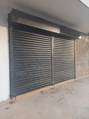 124. Motorized Commercial Entry Door –